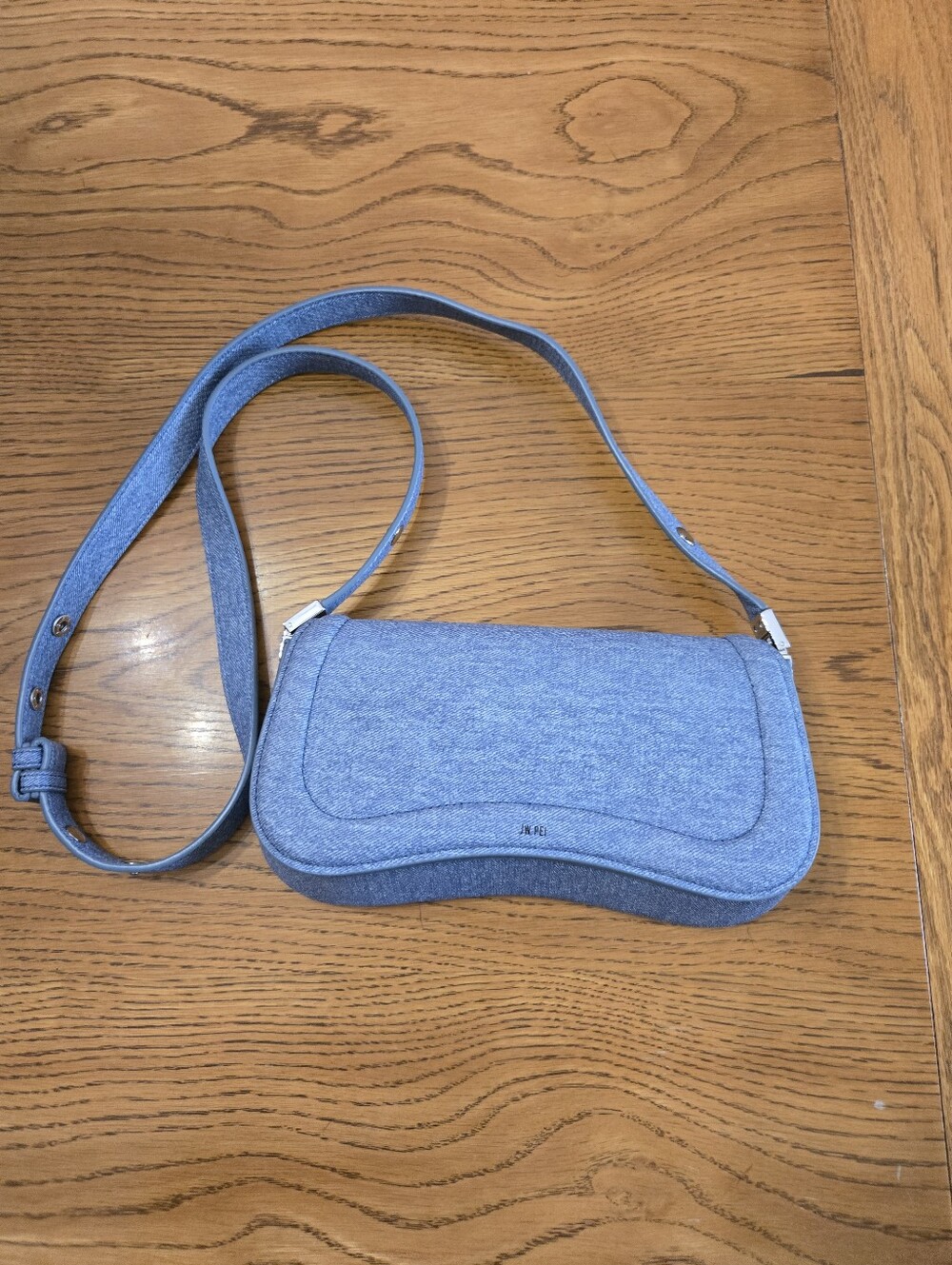 JW PEI Light Blue Curved Crossbody Bag